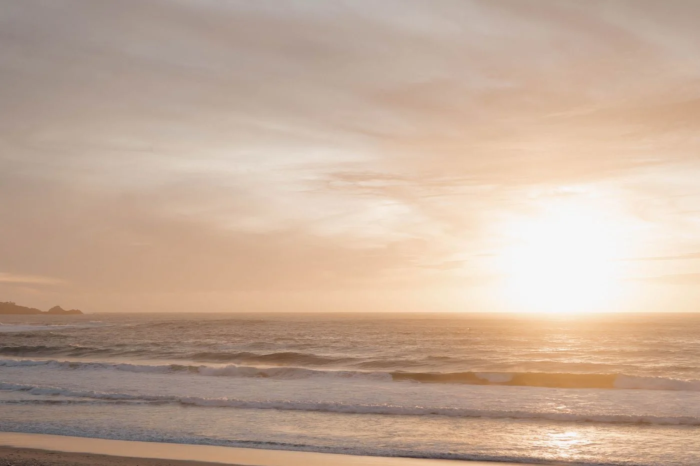Sunset over the waves at Carmel Beach California